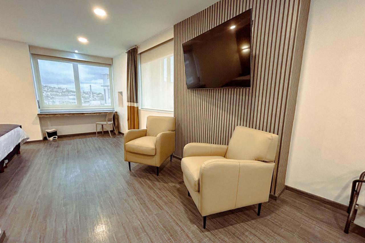 Hunico Hotel Тулансинго Экстерьер фото
