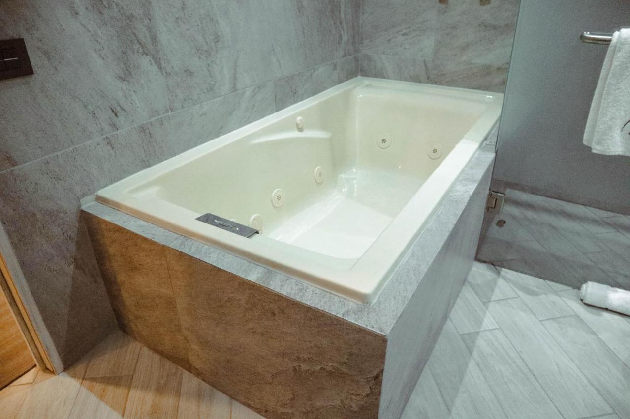 Hunico Hotel Тулансинго Экстерьер фото