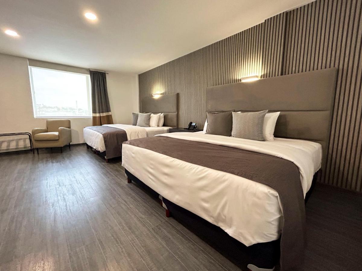 Hunico Hotel Тулансинго Экстерьер фото