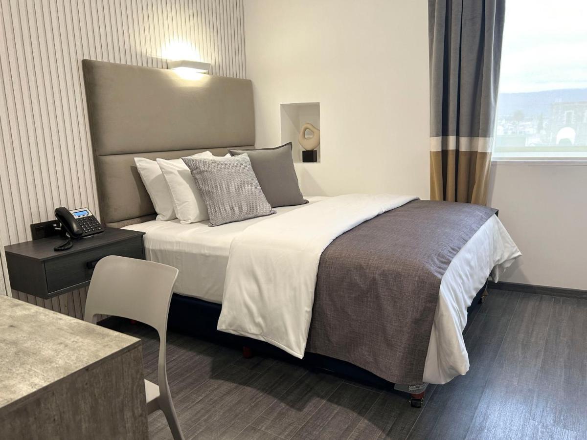 Hunico Hotel Тулансинго Экстерьер фото