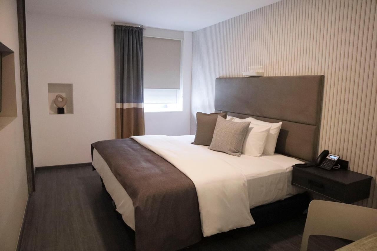Hunico Hotel Тулансинго Экстерьер фото