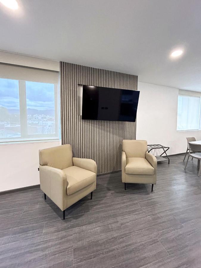 Hunico Hotel Тулансинго Экстерьер фото