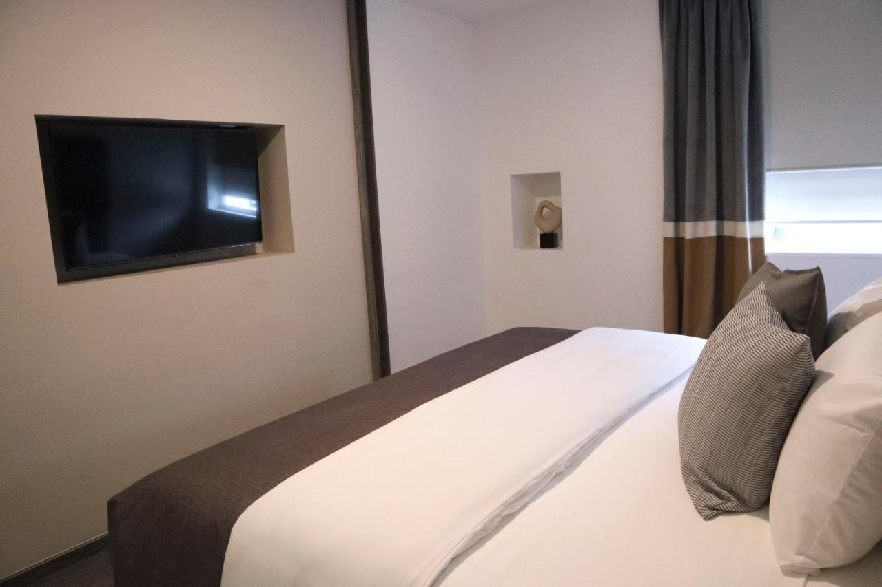 Hunico Hotel Тулансинго Экстерьер фото