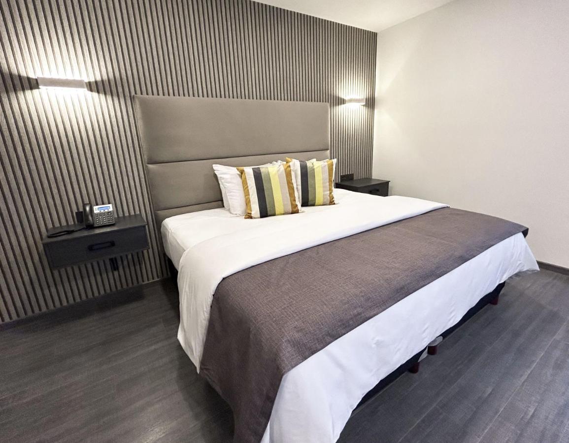 Hunico Hotel Тулансинго Экстерьер фото