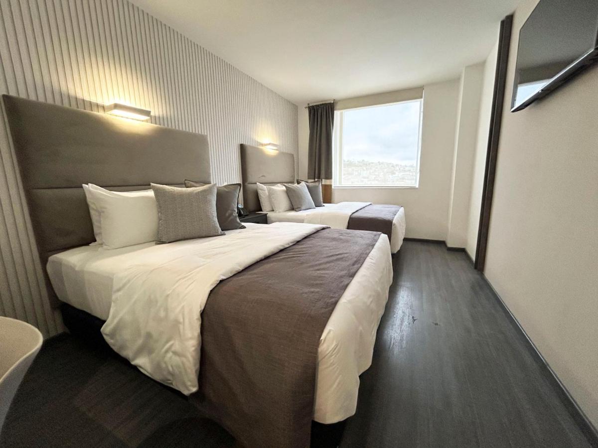 Hunico Hotel Тулансинго Экстерьер фото