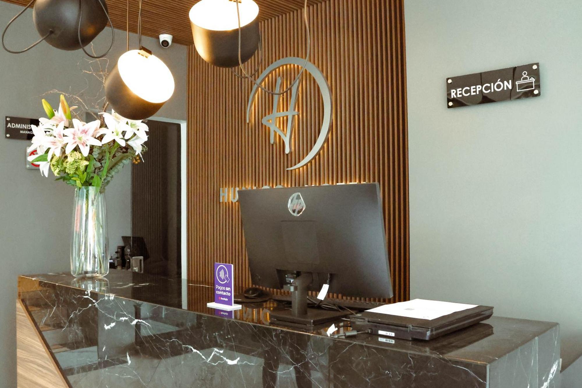 Hunico Hotel Тулансинго Экстерьер фото