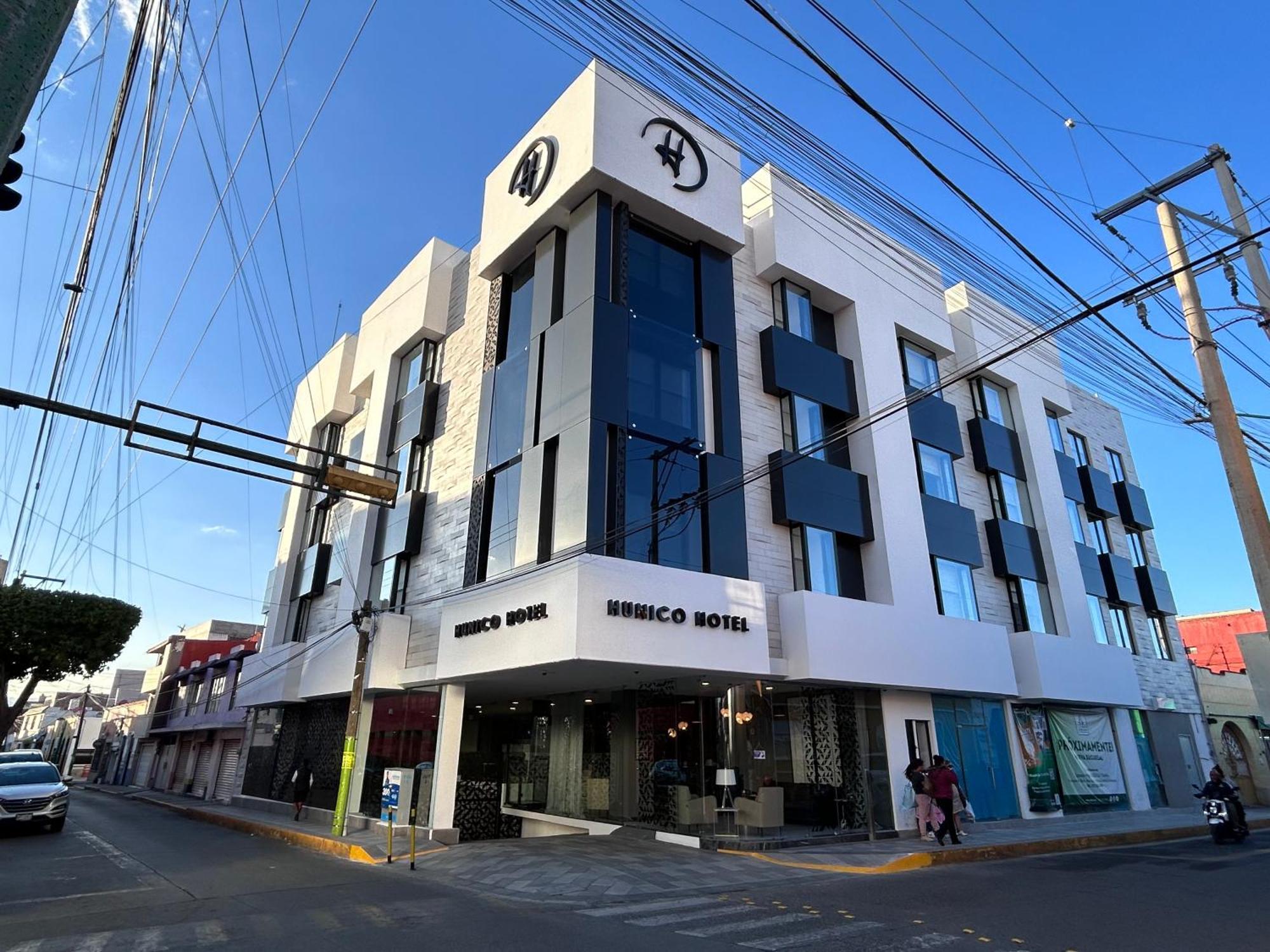 Hunico Hotel Тулансинго Экстерьер фото